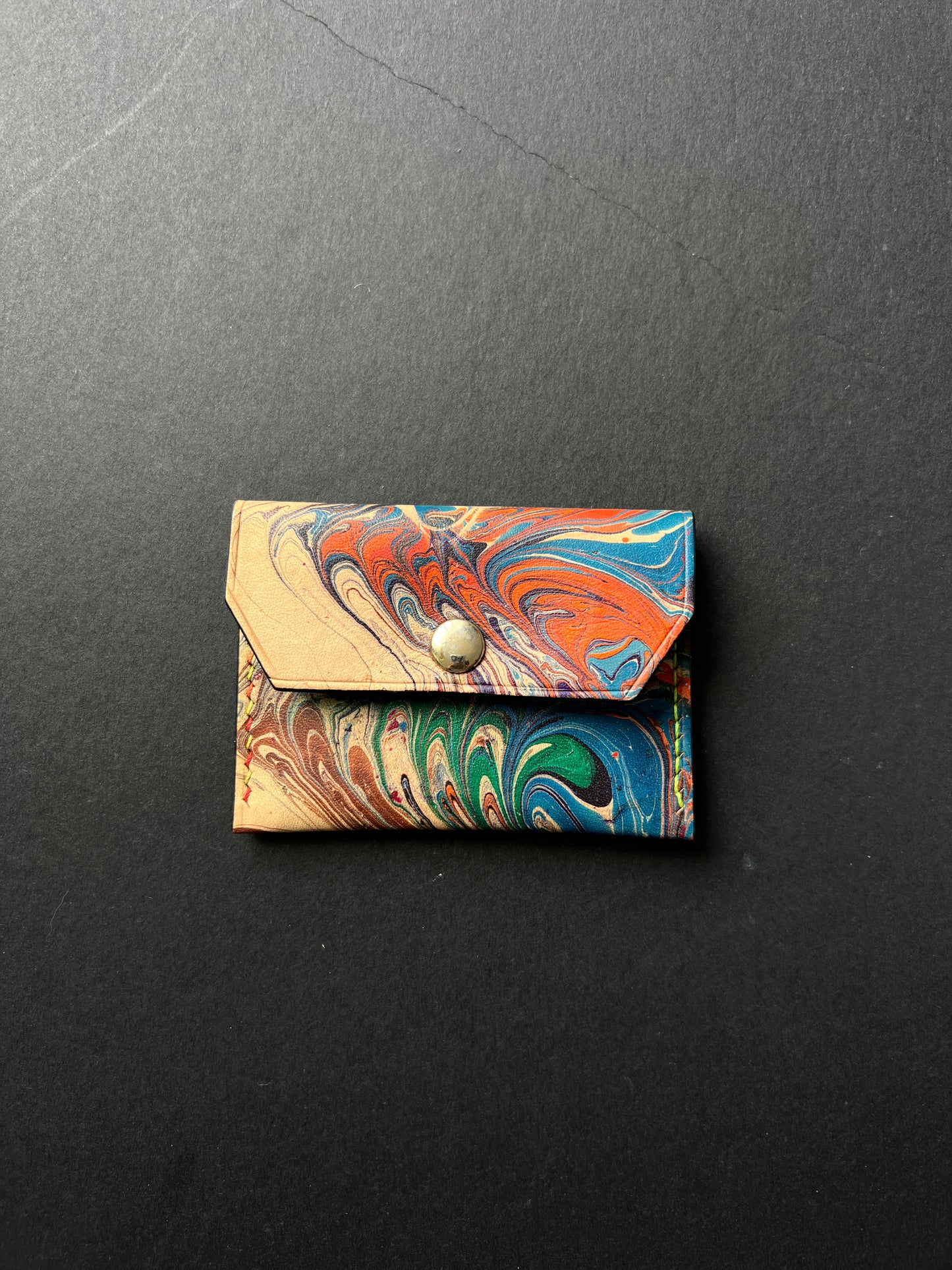 R SOBRE TARJETERO MARBLE